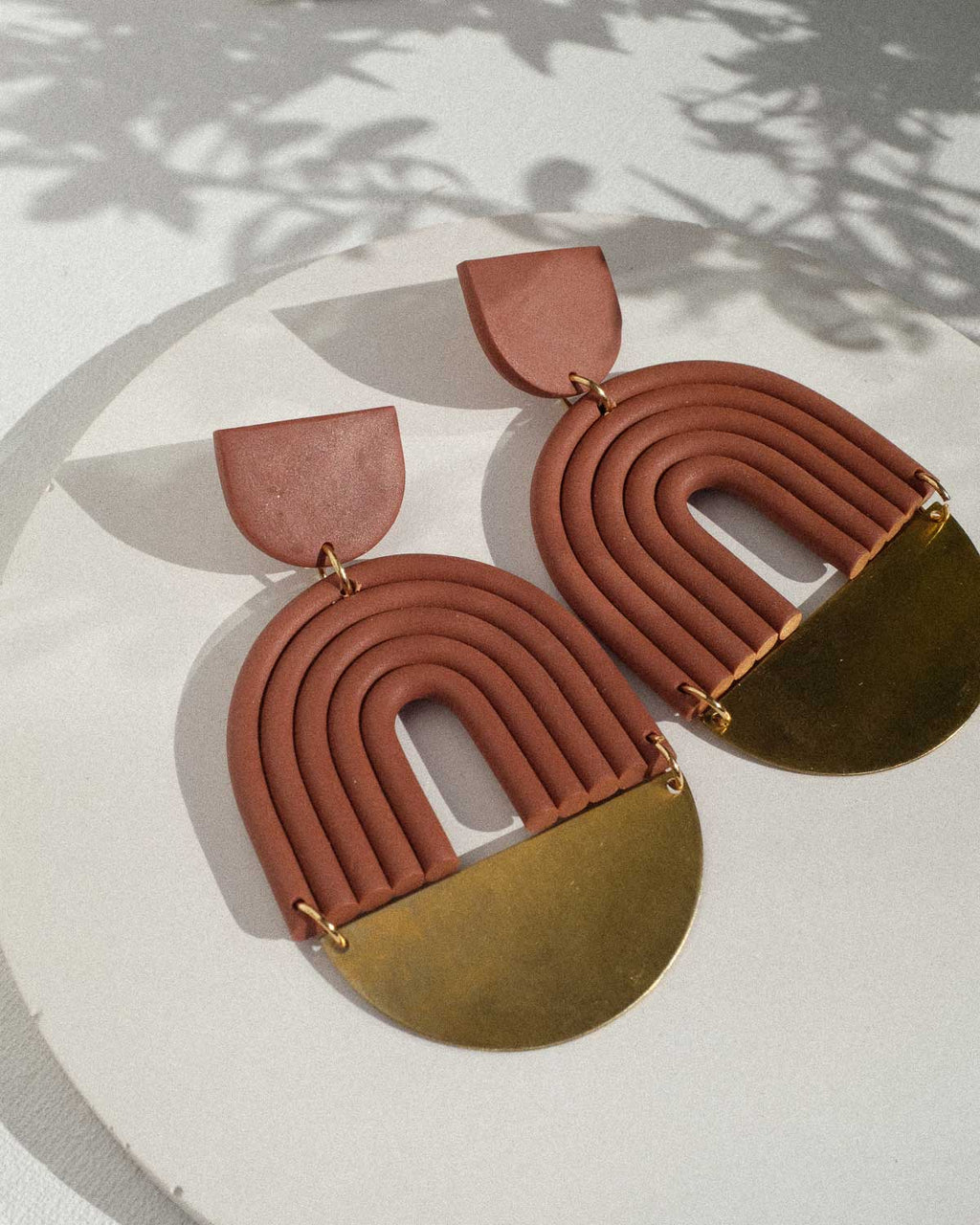 Terracotta & Messing Arches